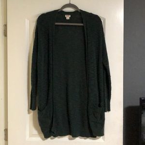 Green knitted cardigan